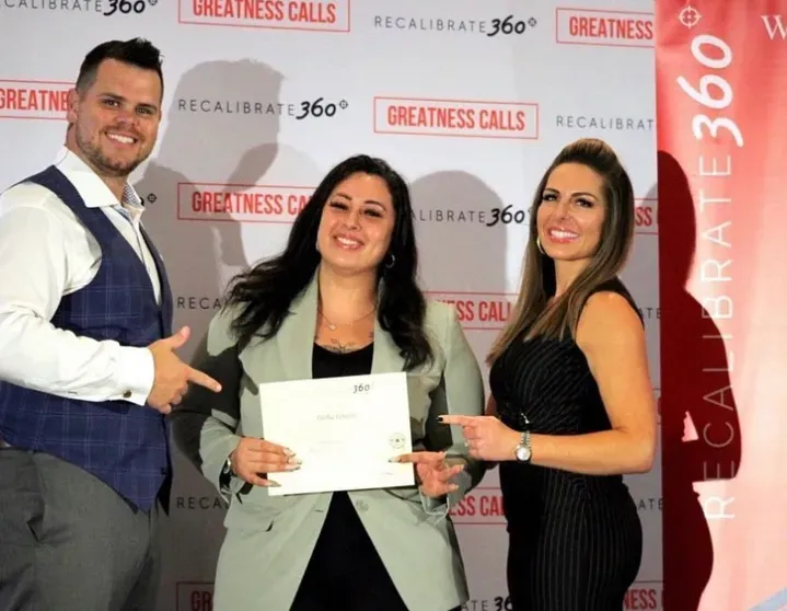 Luxury white modern kitchen with marble backsplash and elegant pendant lighting